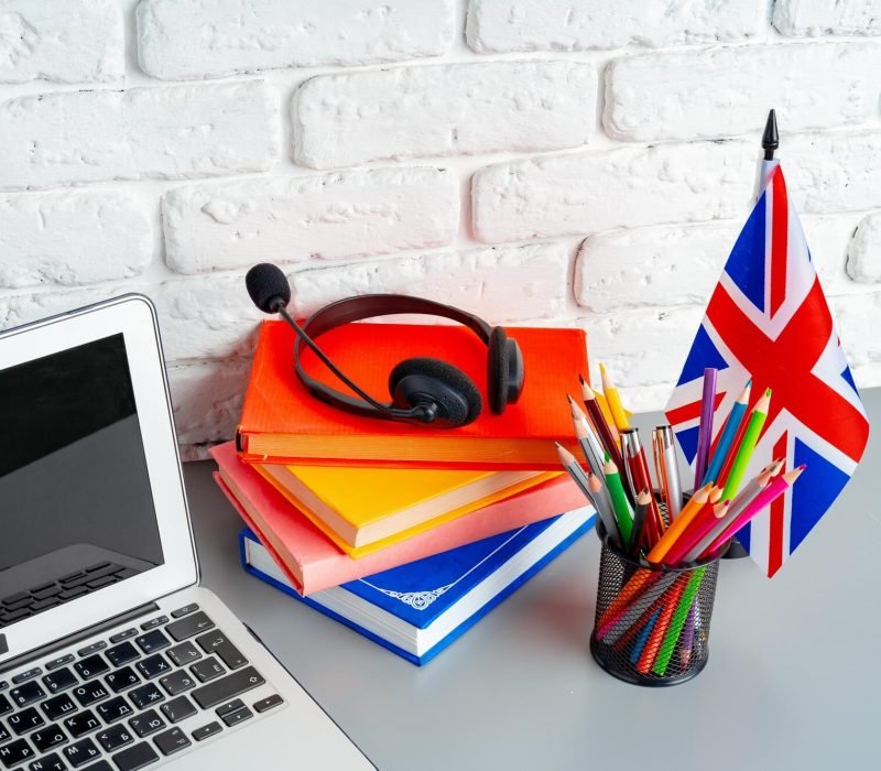 laptop-and-flag-of-uk-on-desk-english-language-learning-concept.jpg